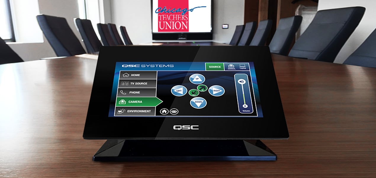 A Q-SYS touch panel displaying conference room controls