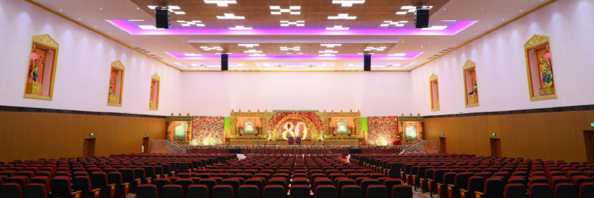 View of the state at the end of a auditorium at Adhiparasakthi College of Arts and Sciences