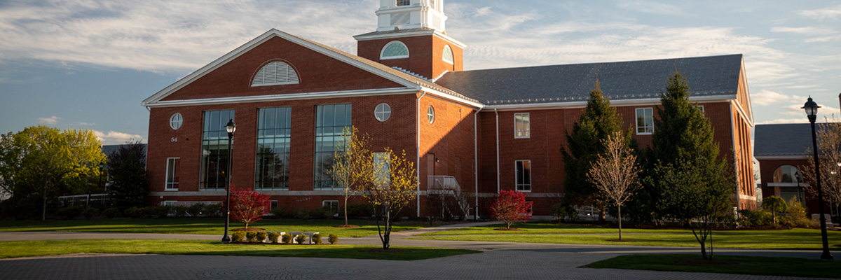 A view of a brick building on the Bentley University Campus